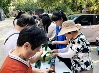 仙营街道开展“粽香传情·端午安康”志愿服务活动