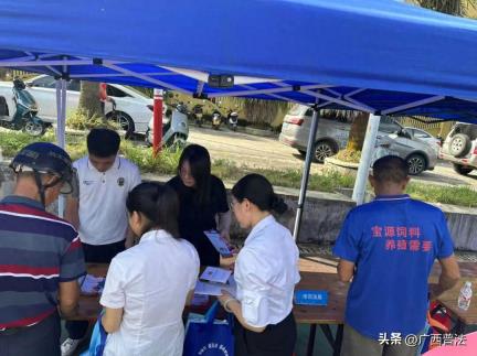 防城港市司法局积极参加“三下乡”法治宣传活动